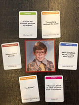 Awkward Family Photos Greatest Hits - Caption Hilarious Pics With Memorable Movie Lines, Best Of Original & Vol 2, Plus New Pics & Movie Lines, Age 13 & Up, Better Cards, Bigger Images & A Card Box.
